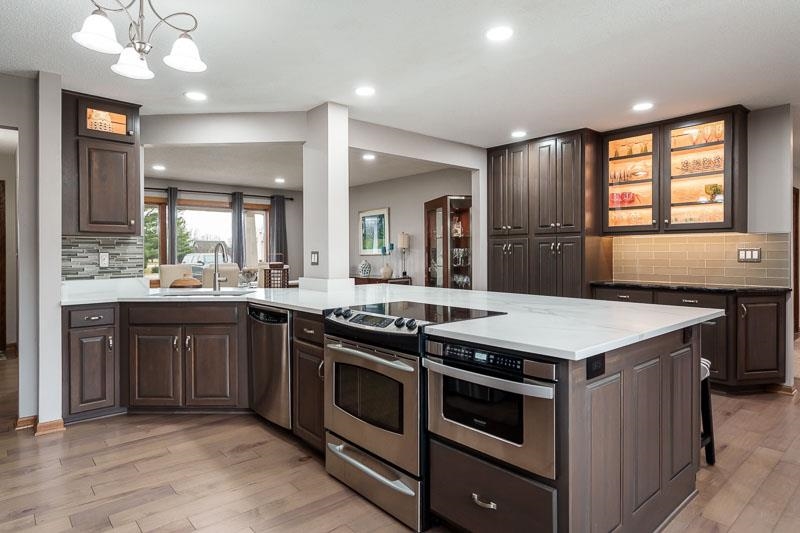 2412 Squaw Prairie Road Belvidere, IL 61008 - Photo 15 of 40 a kitchen with a stove and a sink