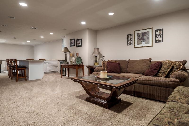 2412 Squaw Prairie Road Belvidere, IL 61008 - Photo 35 of 40 a living room with furniture and kitchen view