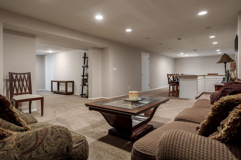 2412 Squaw Prairie Road Belvidere, IL 61008 - Photo 36 of 40 a living room with furniture and a couch