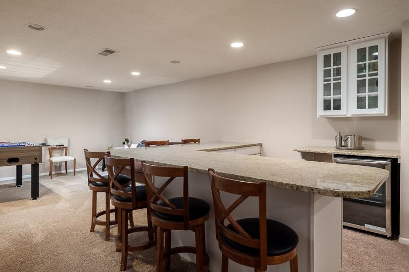 2412 Squaw Prairie Road Belvidere, IL 61008 - Photo 37 of 40 a view of a dining room with furniture