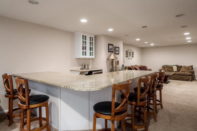 2412 Squaw Prairie Road Belvidere, IL 61008 - Photo 38 of 40 a view of kitchen and dining area with furniture