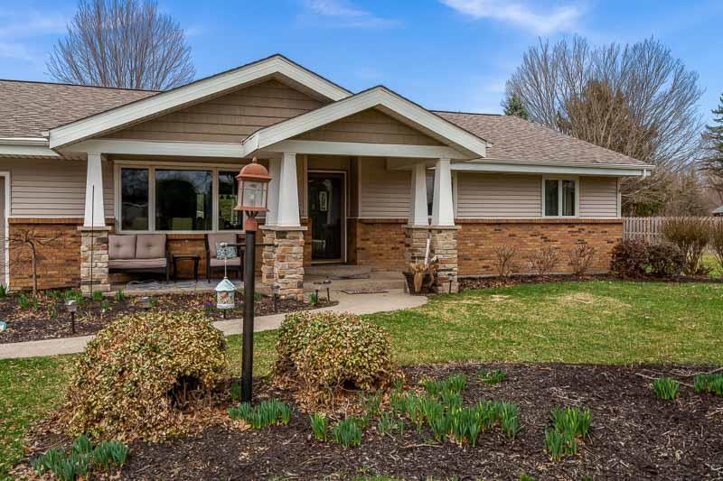 2412 Squaw Prairie Road Belvidere, IL 61008 - Photo 5 of 40 a front view of a house with garden