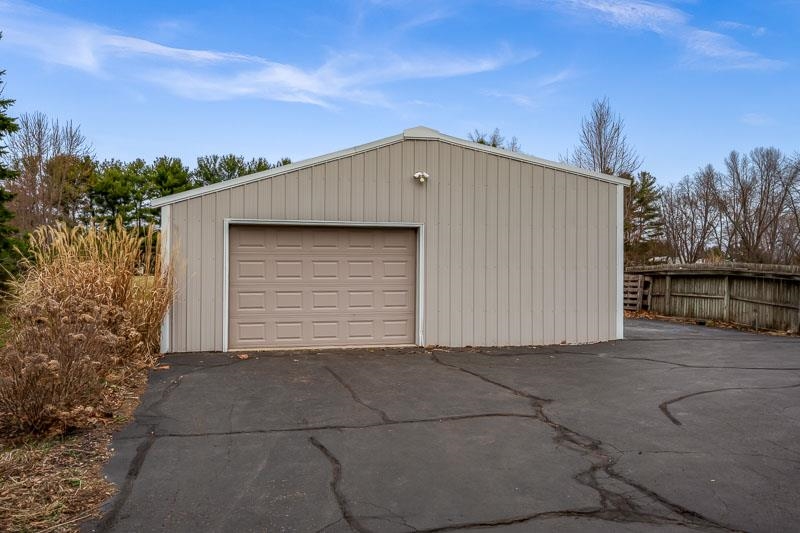 2412 Squaw Prairie Road Belvidere, IL 61008 - Photo 8 of 40 a view of a house with a garage