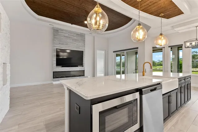 a kitchen with cabinets a sink and dishwasher