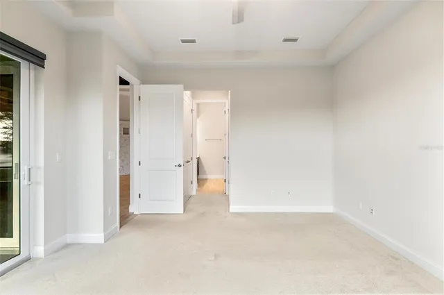 an aerial view of a house with a lake view