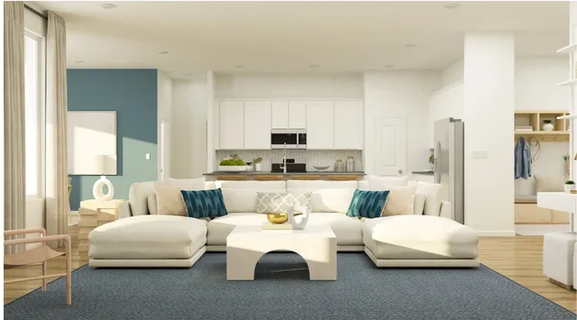 a living room with furniture and a table