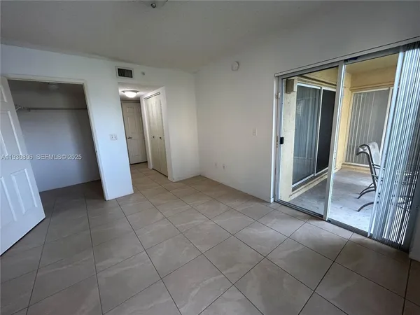 a view of a room and window