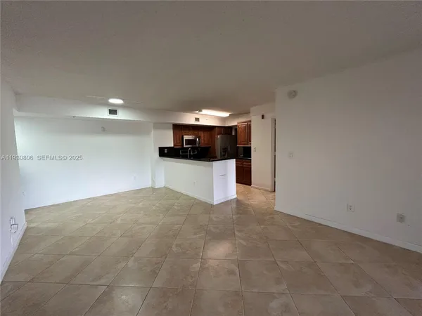a view of a house with backyard porch and sitting area