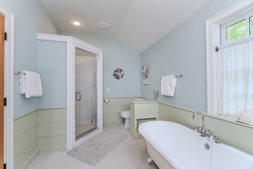 324 Pomeroy Lane Amherst, MA 01002 - Photo 34 of 42 a bathroom with a sink and mirror with toilet
