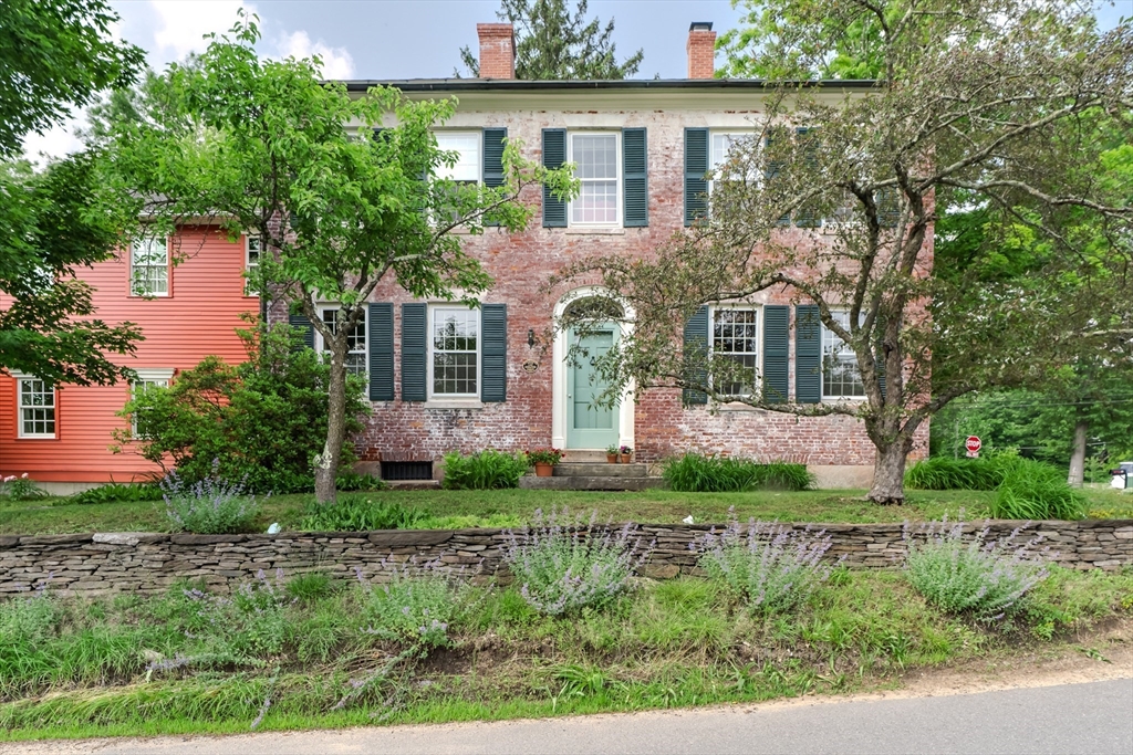 324 Pomeroy Lane Amherst, MA 01002 - Photo 4 of 42 front view of house with a yard