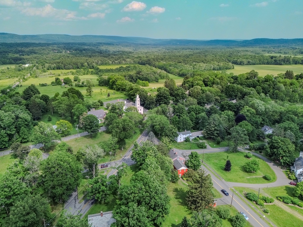 324 Pomeroy Lane Amherst, MA 01002 - Photo 7 of 42 an aerial view of residential houses with outdoor space and trees
