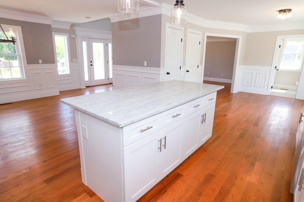 7 Ayer Road Littleton, MA 01460 - Photo 11 of 39 a view of a kitchen cabinets and wooden floor