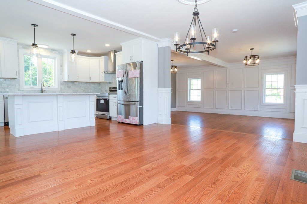 7 Ayer Road Littleton, MA 01460 - Photo 17 of 39 a view of a kitchen with a dishwasher cabinets and wooden floor