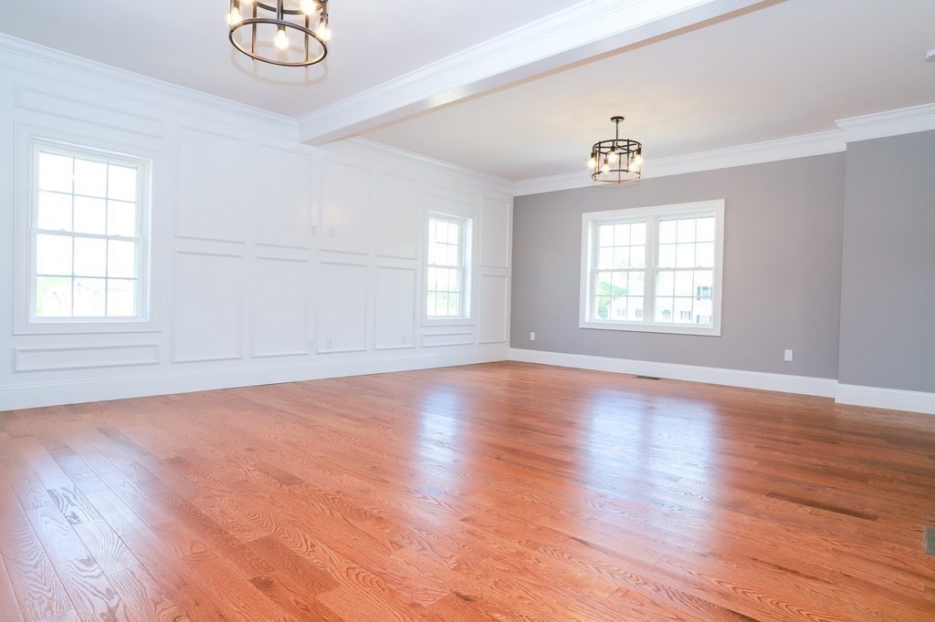 7 Ayer Road Littleton, MA 01460 - Photo 18 of 39 an empty room with wooden floor and windows