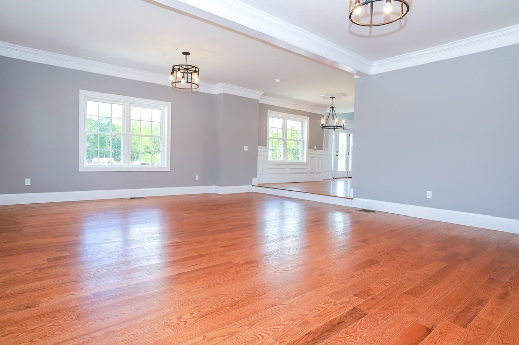 7 Ayer Road Littleton, MA 01460 - Photo 19 of 39 an empty room with wooden floor and windows