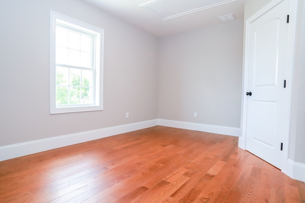 7 Ayer Road Littleton, MA 01460 - Photo 29 of 39 an empty room with a window