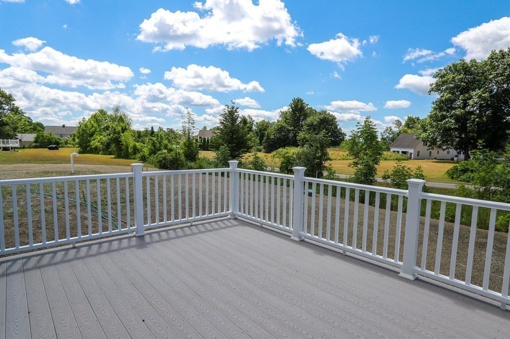 7 Ayer Road Littleton, MA 01460 - Photo 3 of 39 a view of a balcony with an outdoor space