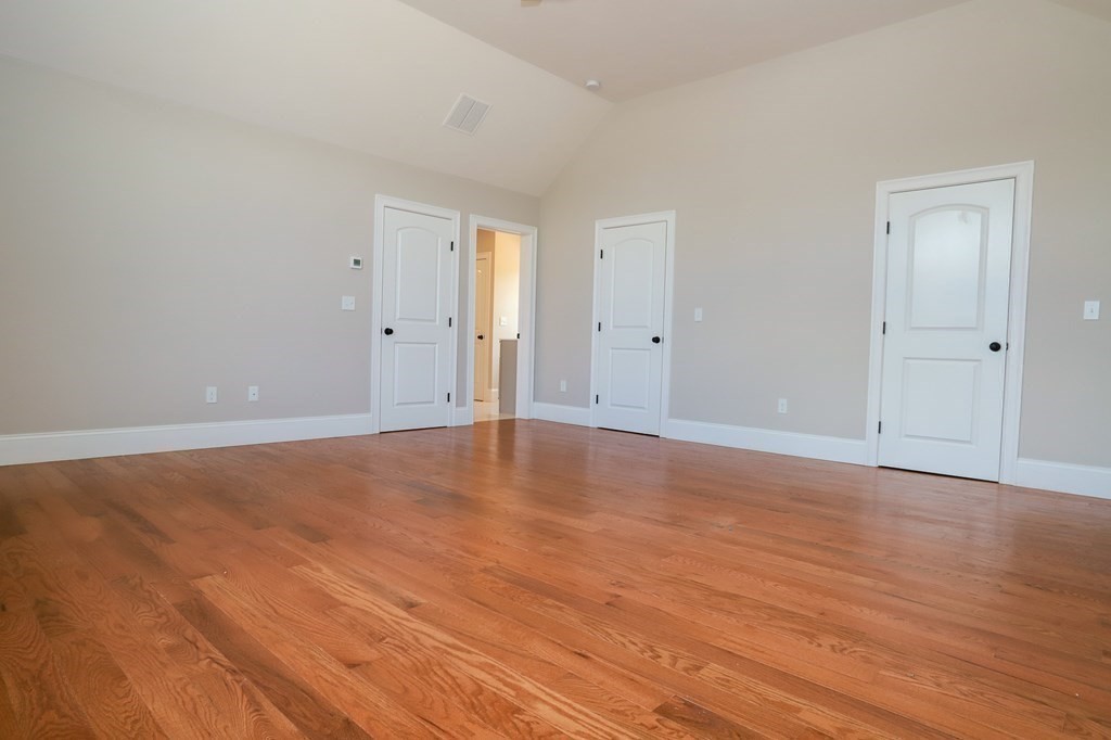 7 Ayer Road Littleton, MA 01460 - Photo 33 of 39 a view of an empty room and wooden floor