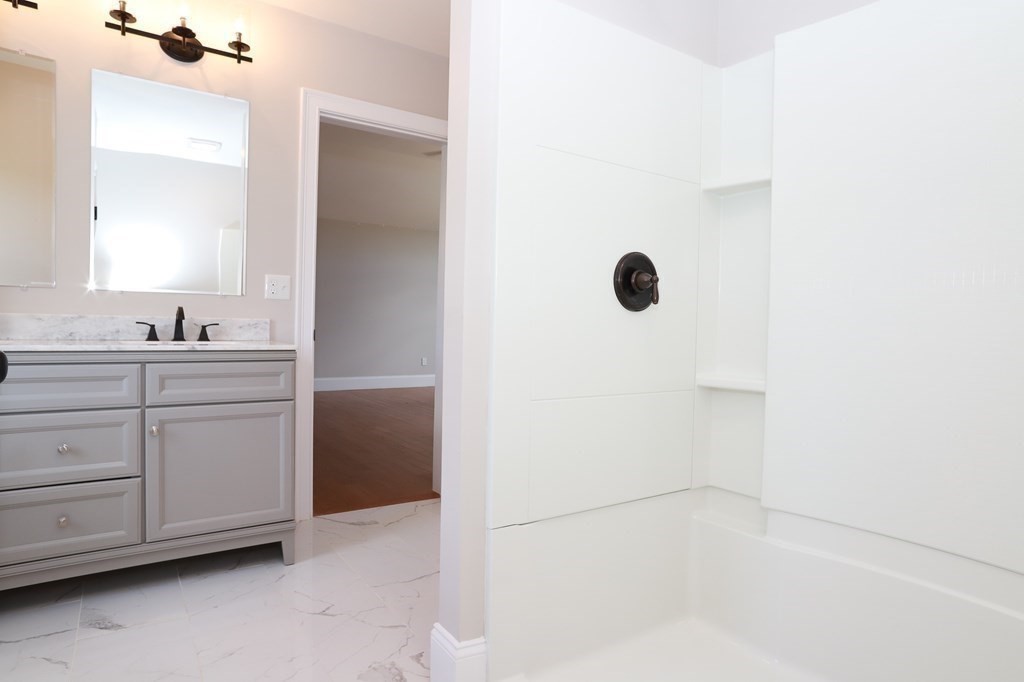 7 Ayer Road Littleton, MA 01460 - Photo 37 of 39 a bathroom with a sink