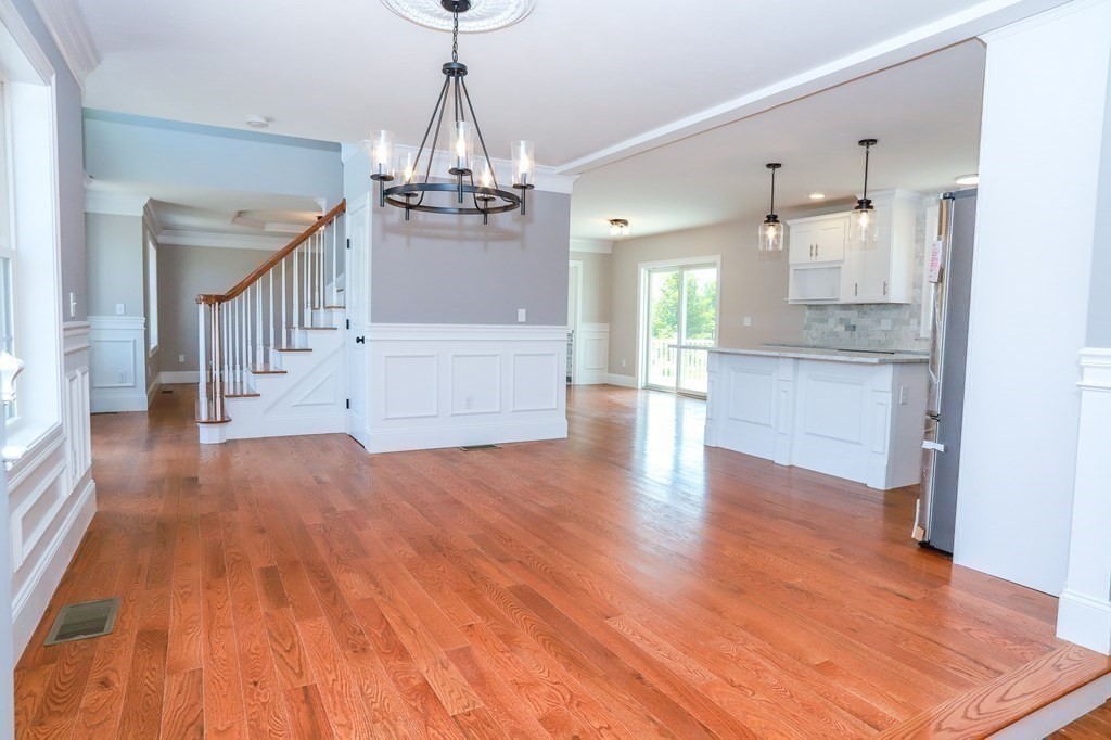 7 Ayer Road Littleton, MA 01460 - Photo 6 of 39 a view of a kitchen and wooden floor