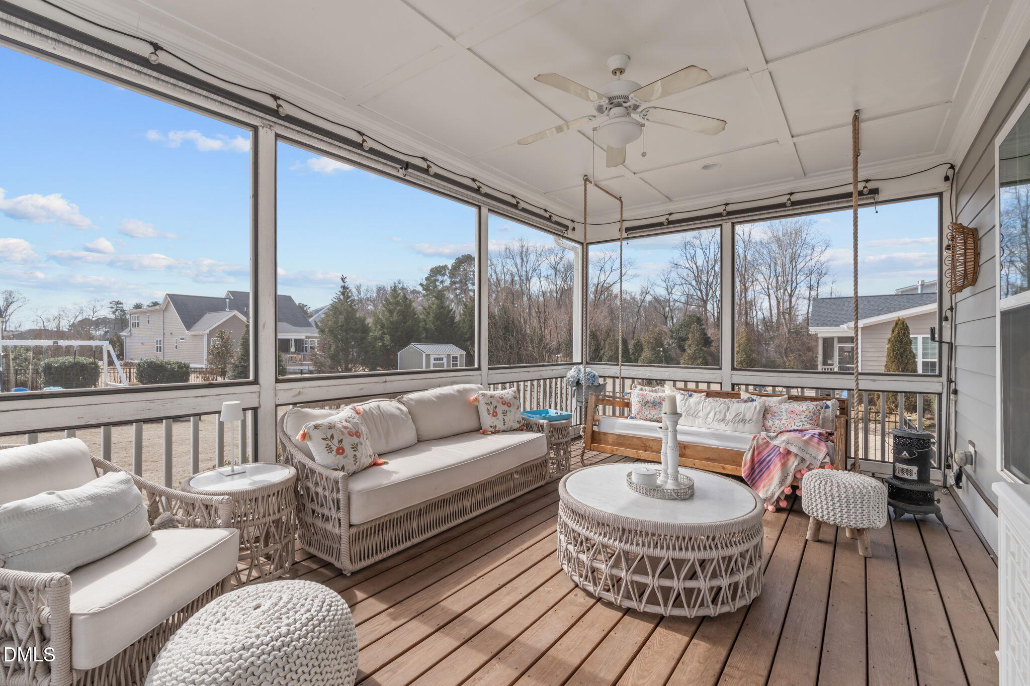 4144 Olde Judd Drive Willow Spring, NC 27592 - Photo 1 of 52 a living room with furniture and a floor to ceiling window