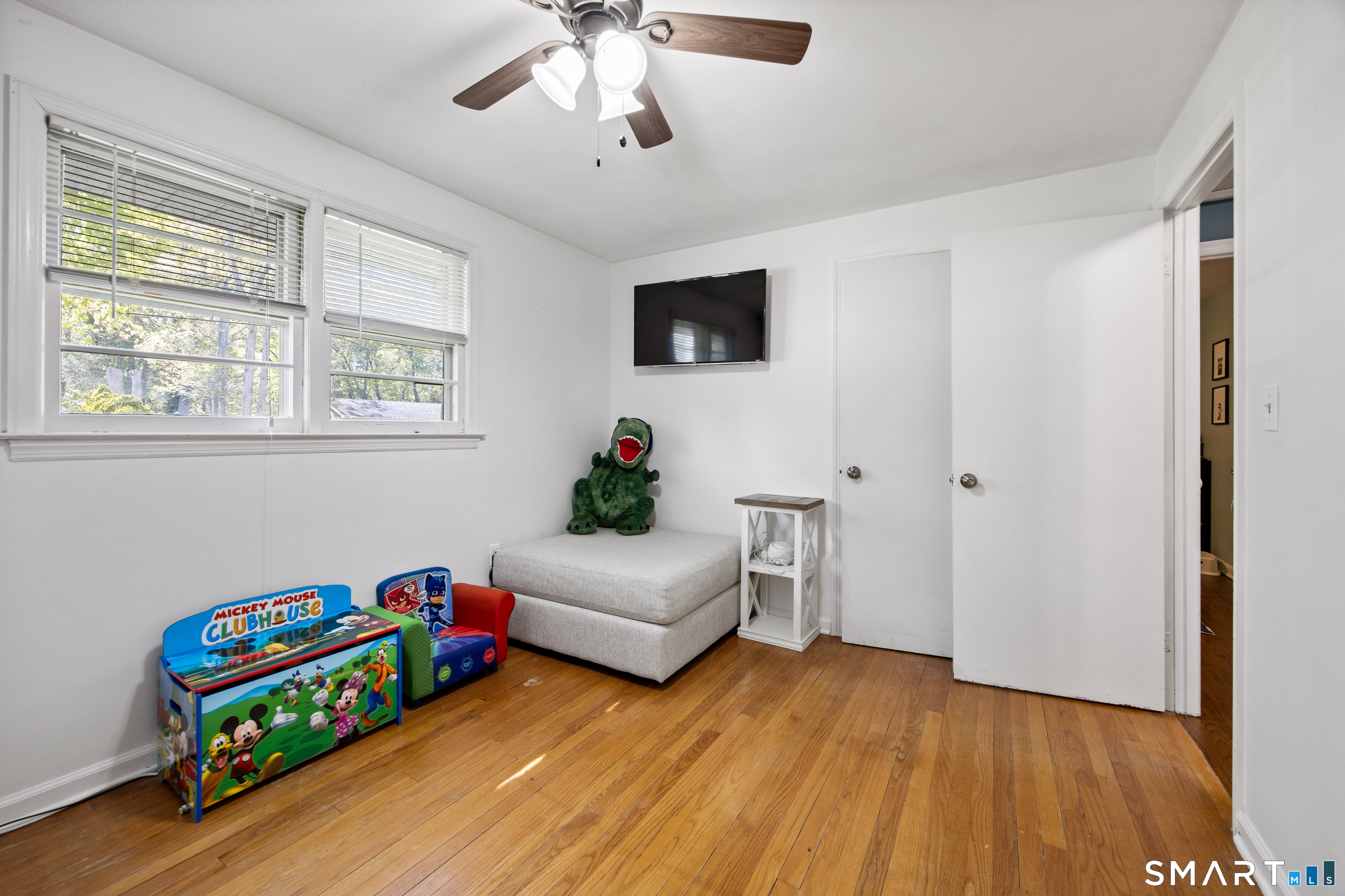 39 Grove Road North Haven, CT 06473 - Photo 16 of 38 a bedroom with furniture and a wooden floor