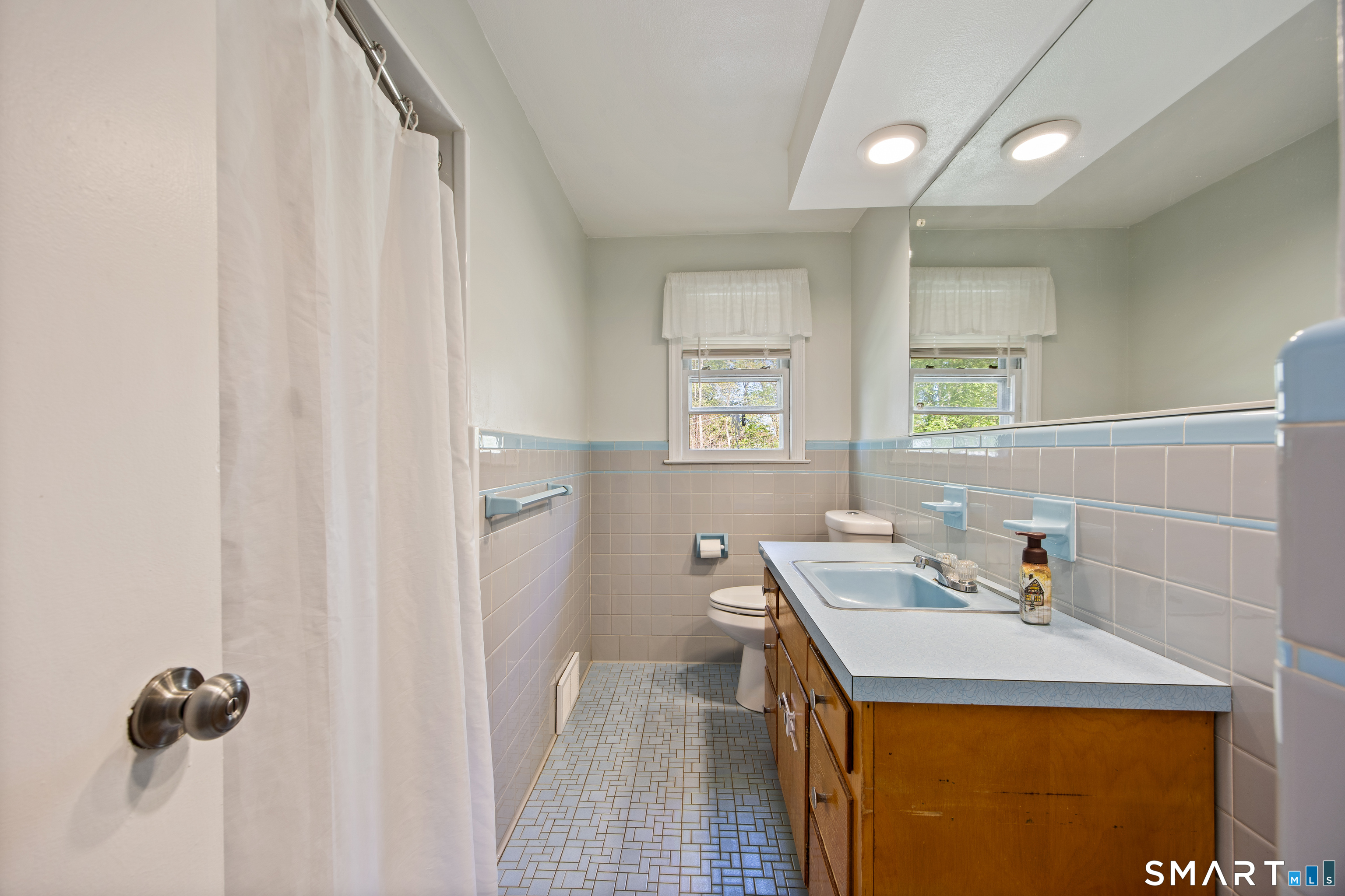 39 Grove Road North Haven, CT 06473 - Photo 18 of 38 a bathroom with a sink vanity granite and toilet