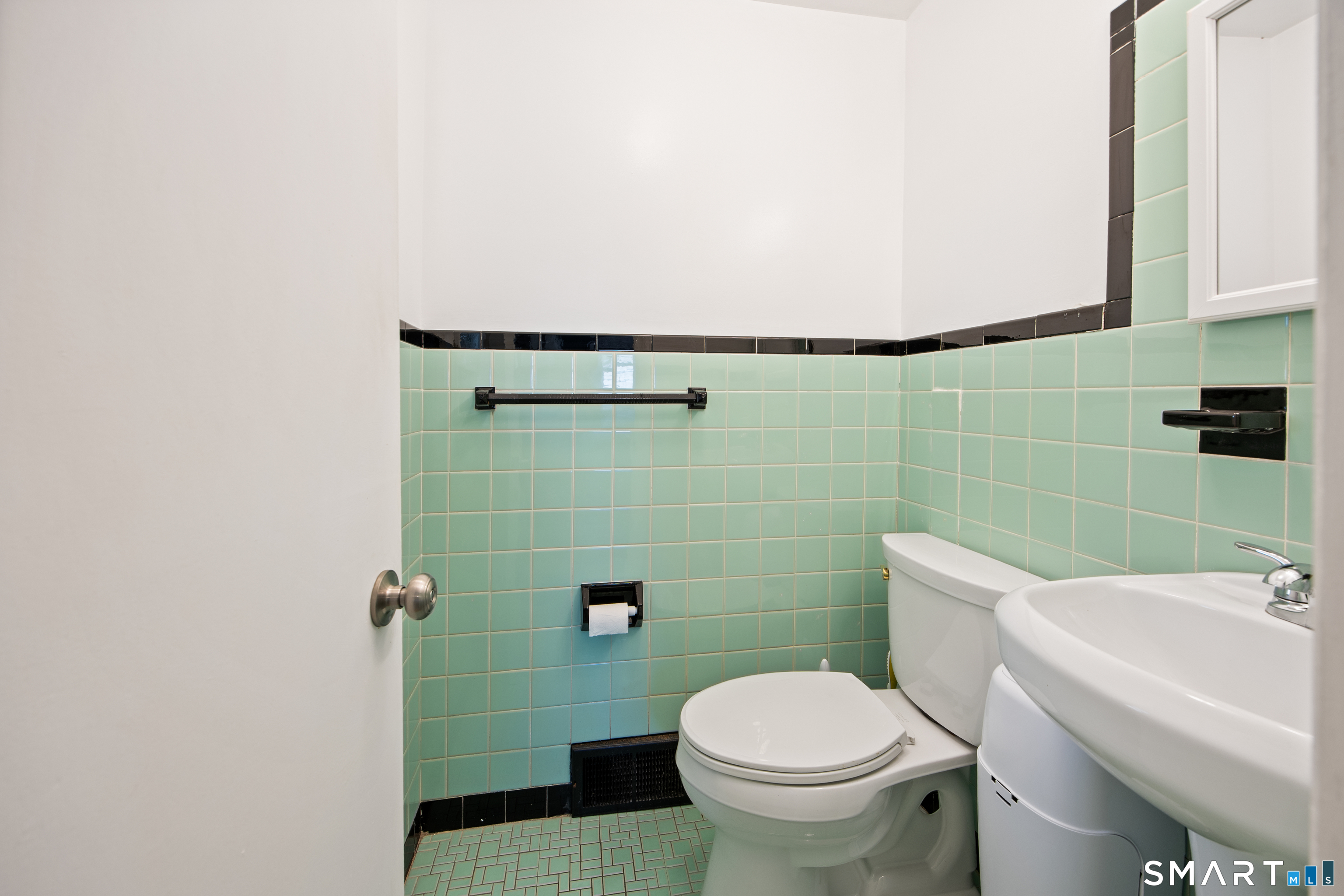 39 Grove Road North Haven, CT 06473 - Photo 24 of 38 a bathroom with a toilet and a sink