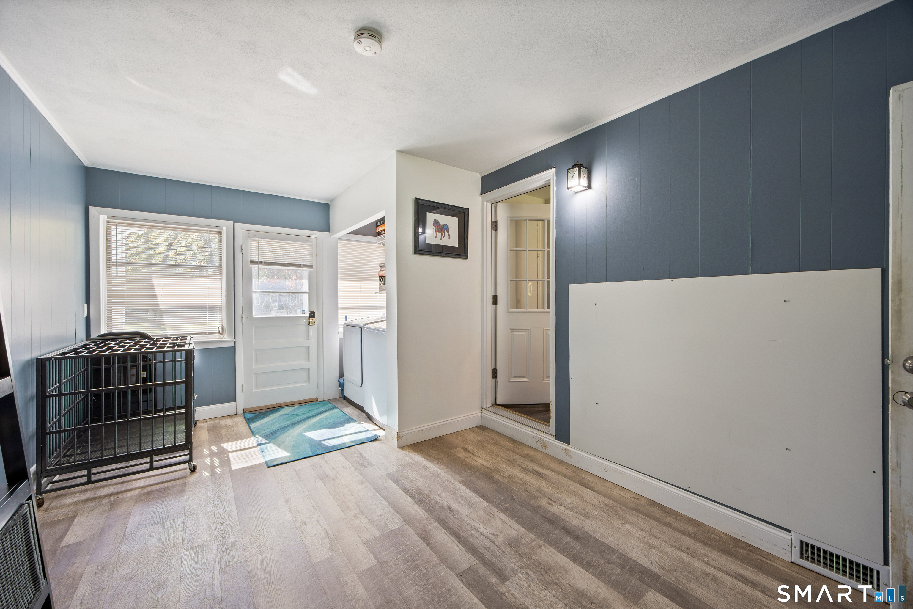 39 Grove Road North Haven, CT 06473 - Photo 28 of 38 a view of a livingroom with wooden floor