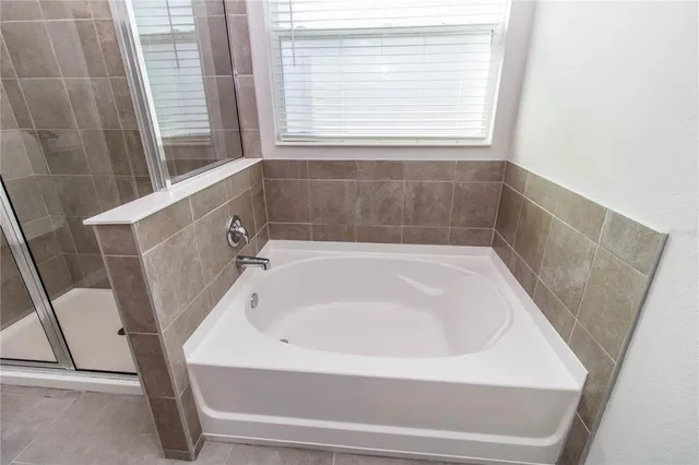 a bathroom with a bathtub