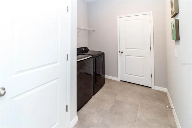 a view of kitchen and utility room