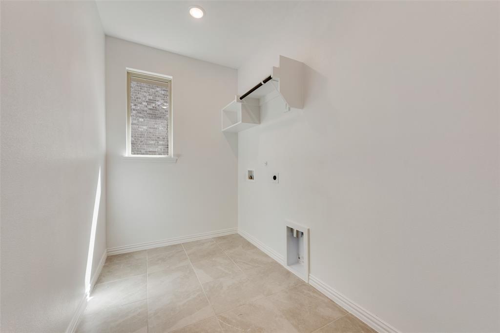 4136 Tarlton Road Little Elm, TX 75068 - Photo 14 of 28 a view of an empty room with a fan