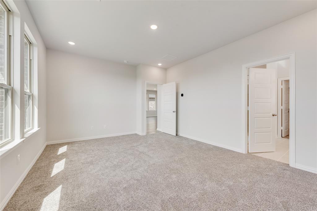 4136 Tarlton Road Little Elm, TX 75068 - Photo 16 of 28 a view of an empty room with a window