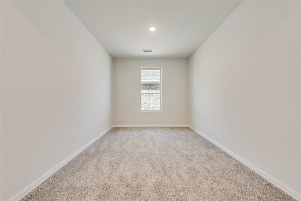 4136 Tarlton Road Little Elm, TX 75068 - Photo 22 of 28 an empty room with a window