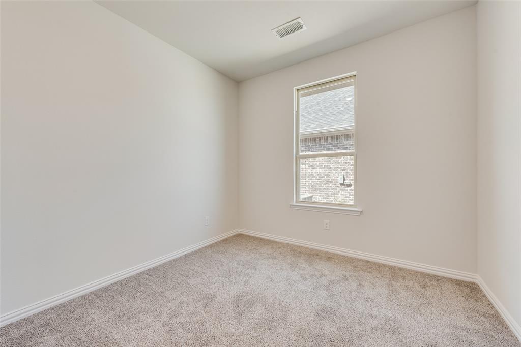 4136 Tarlton Road Little Elm, TX 75068 - Photo 25 of 28 an empty room with a window