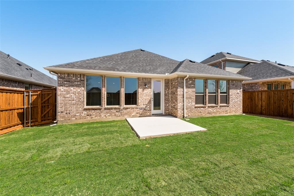 4136 Tarlton Road Little Elm, TX 75068 - Photo 27 of 28 a front view of a house with a yard