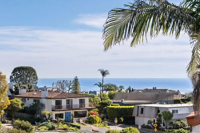 a view of a city with tall buildings