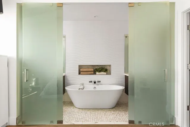 a view of a bathtub in bathroom
