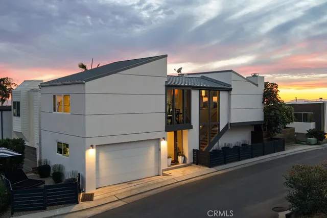 a view of a house with a street