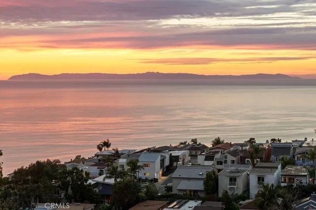 a view of a ocean and a mountain