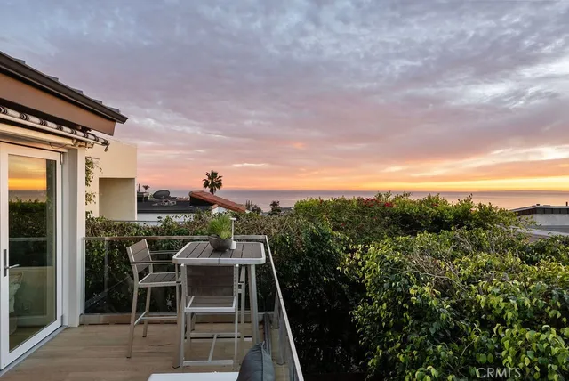 a view of a chairs and table in the terrace