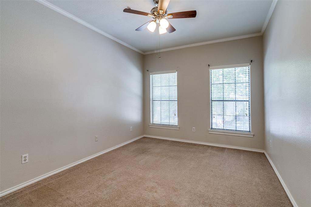 6003 Oram Street, Unit 104 Dallas, TX 75206 - Photo 11 of 23 a view of an empty room with a window