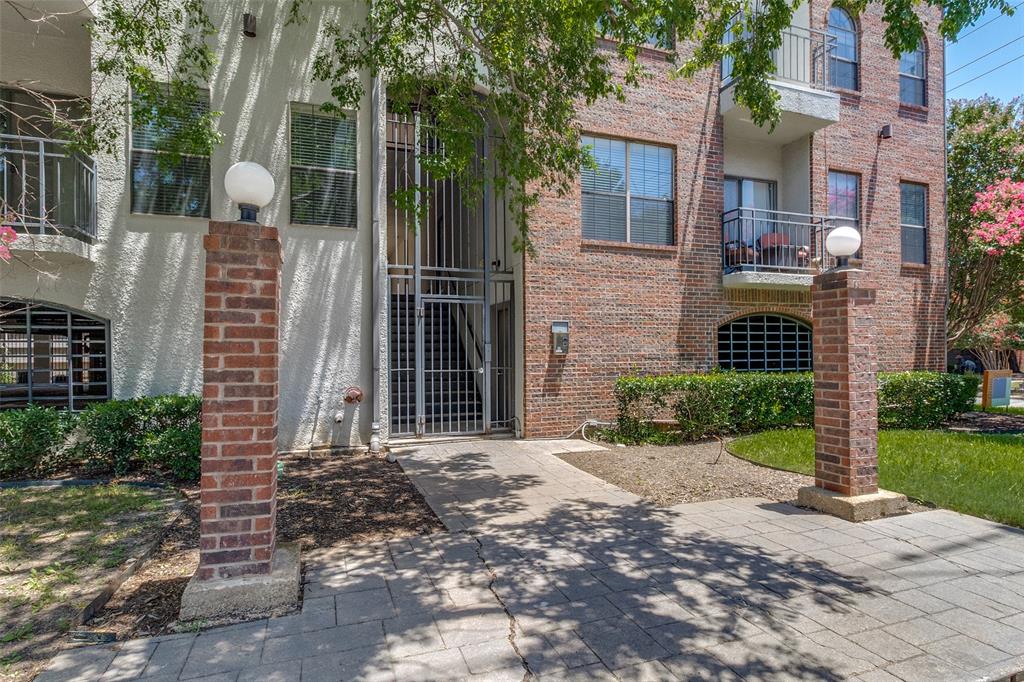 6003 Oram Street, Unit 104 Dallas, TX 75206 - Photo 19 of 23 a front view of a house with garden