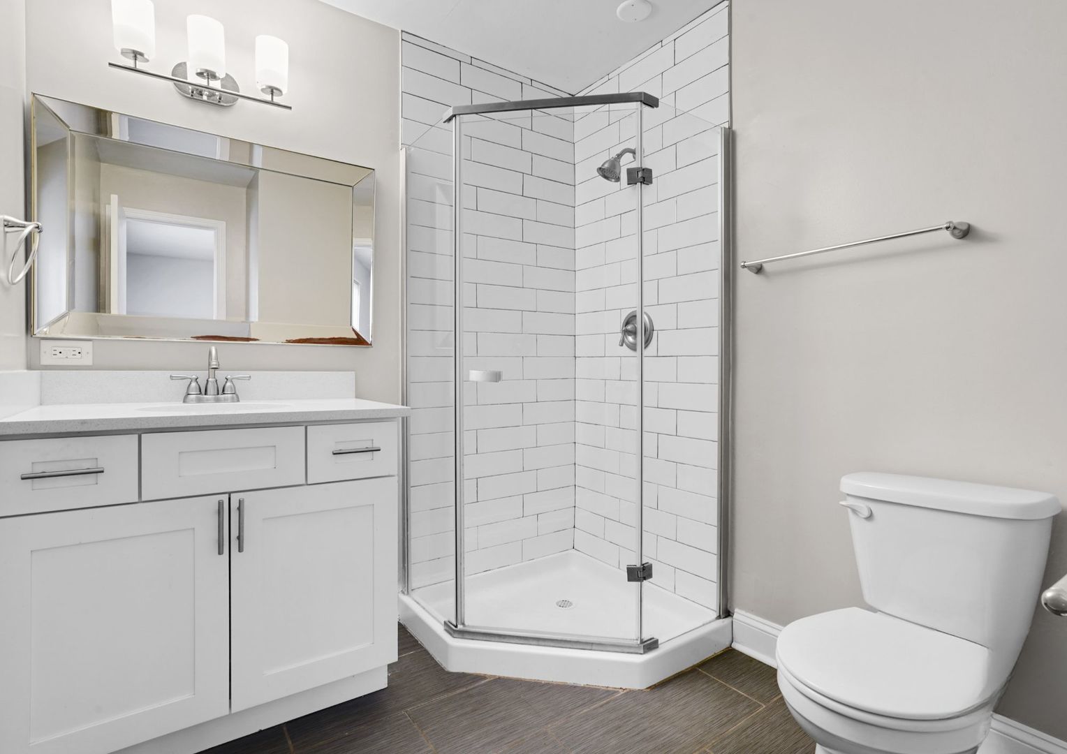 294 Madison Avenue Calumet City, IL 60409 - Photo 12 of 19 a bathroom with a shower a sink a toilet and a mirror