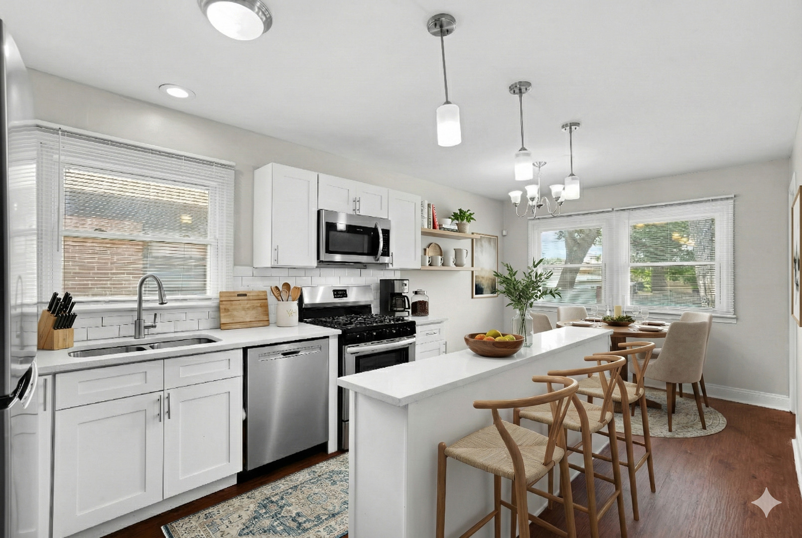 294 Madison Avenue Calumet City, IL 60409 - Photo 3 of 19 a kitchen with a stove a sink a dining table and chairs
