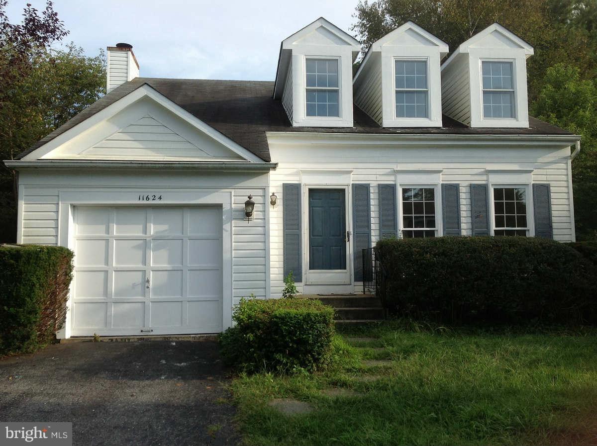 11624 Bootjack Court North Potomac, MD 20878 - Photo 1 of 15 a front view of a house with a yard