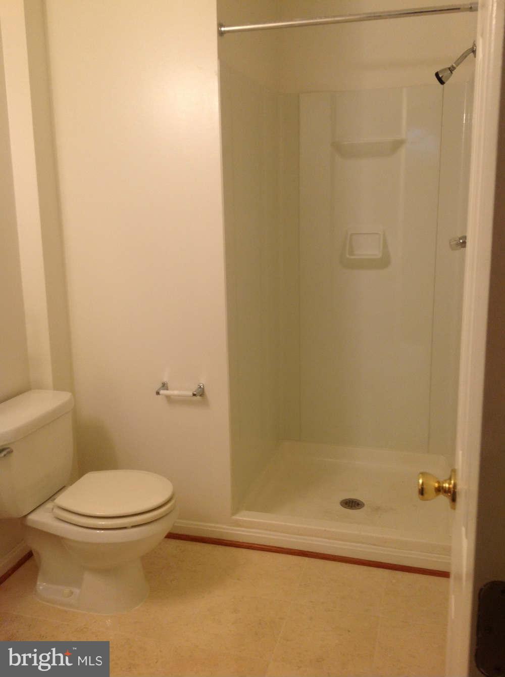 11624 Bootjack Court North Potomac, MD 20878 - Photo 14 of 15 a bathroom with a toilet and a shower