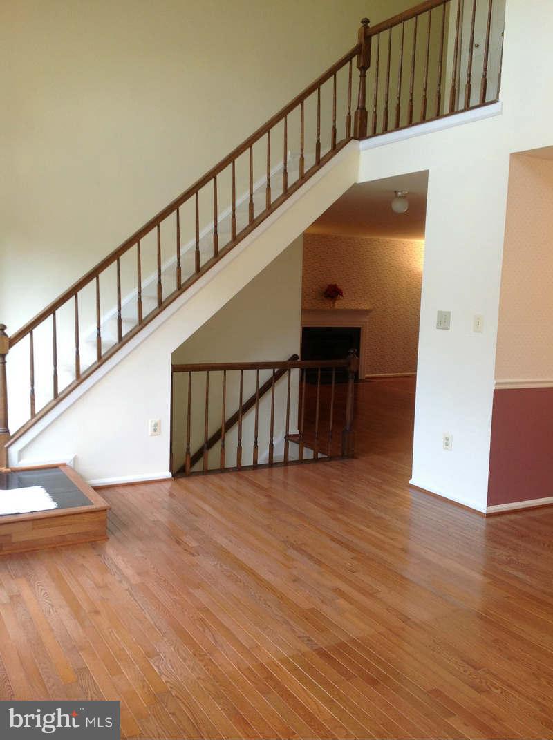 11624 Bootjack Court North Potomac, MD 20878 - Photo 2 of 15 a view of entryway with wooden floor