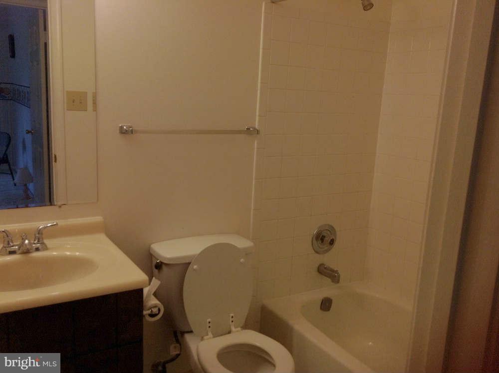 11624 Bootjack Court North Potomac, MD 20878 - Photo 7 of 15 a bathroom with a sink toilet and shower