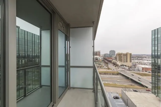 a view of a balcony with city view